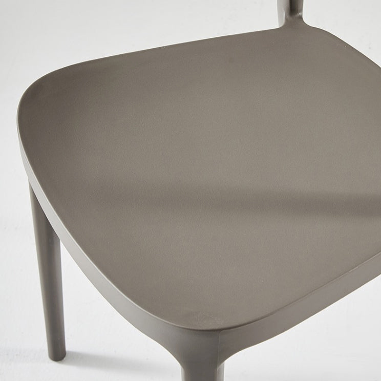 Silla de plástico de silla lateral de apilamiento interior moderno con tapizado