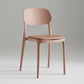 Silla de plástico de silla lateral de apilamiento interior moderno con tapizado