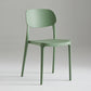 Silla de plástico de silla lateral de apilamiento interior moderno con tapizado