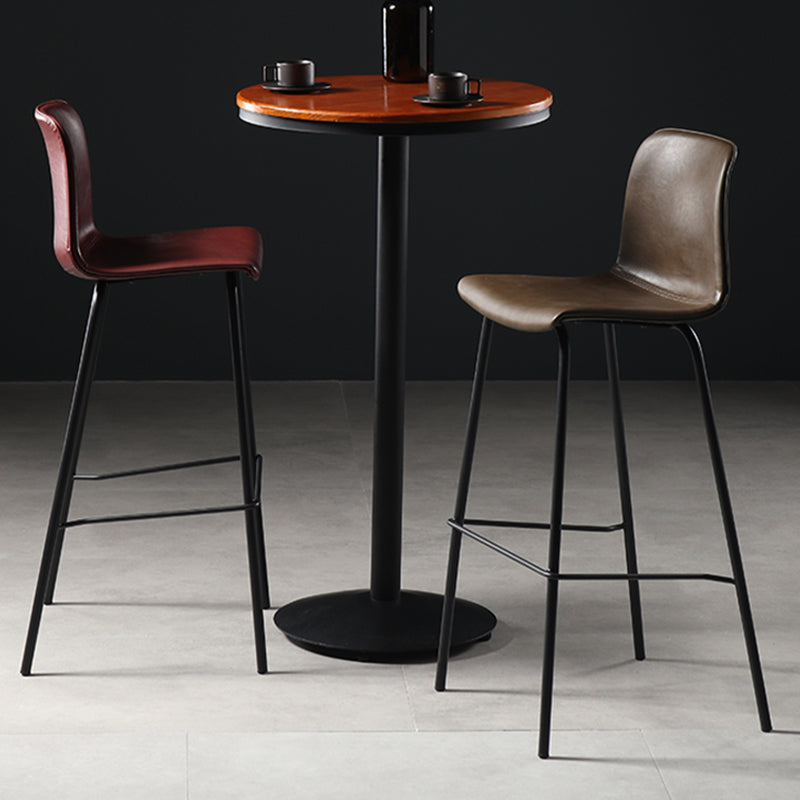 Eigentijdse rugleuning faux lederen armloze barkruk met voetsteun