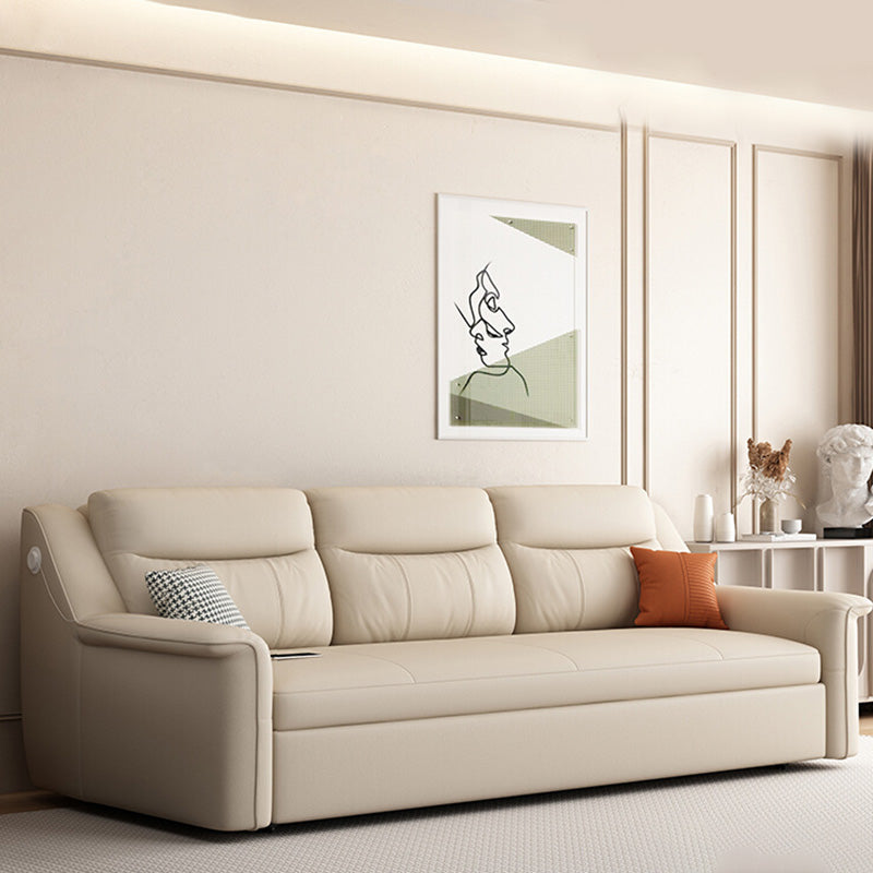 Canapé-lit beige futon beige de style glamour avec dos lâche en cuir collé