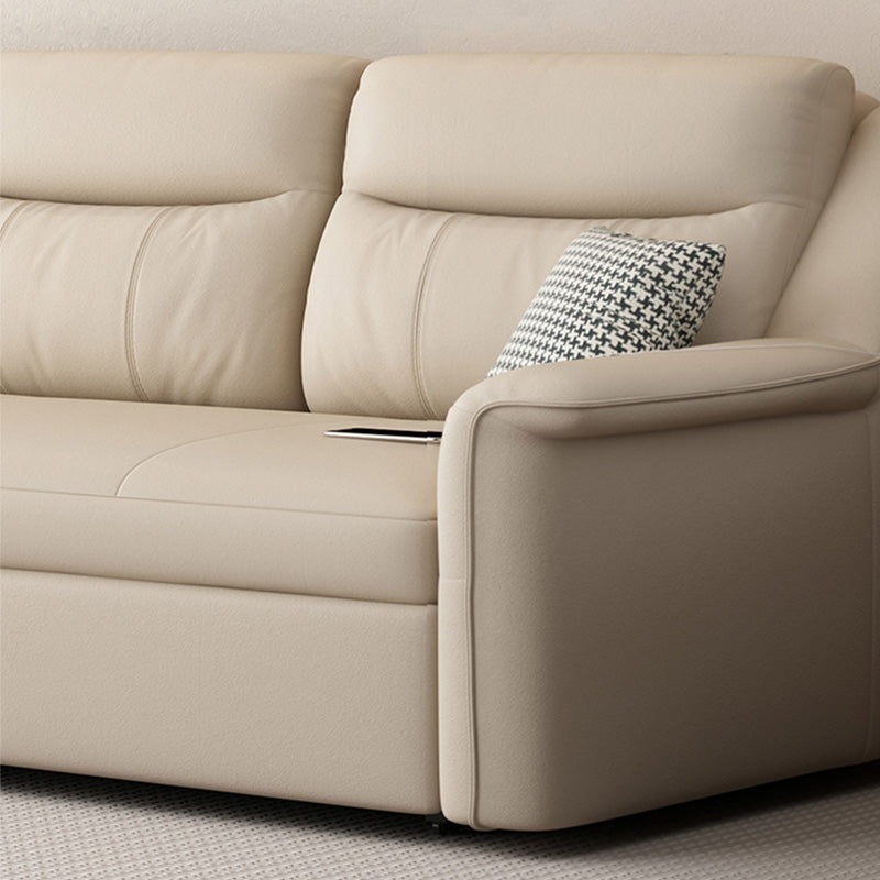 Canapé-lit beige futon beige de style glamour avec dos lâche en cuir collé