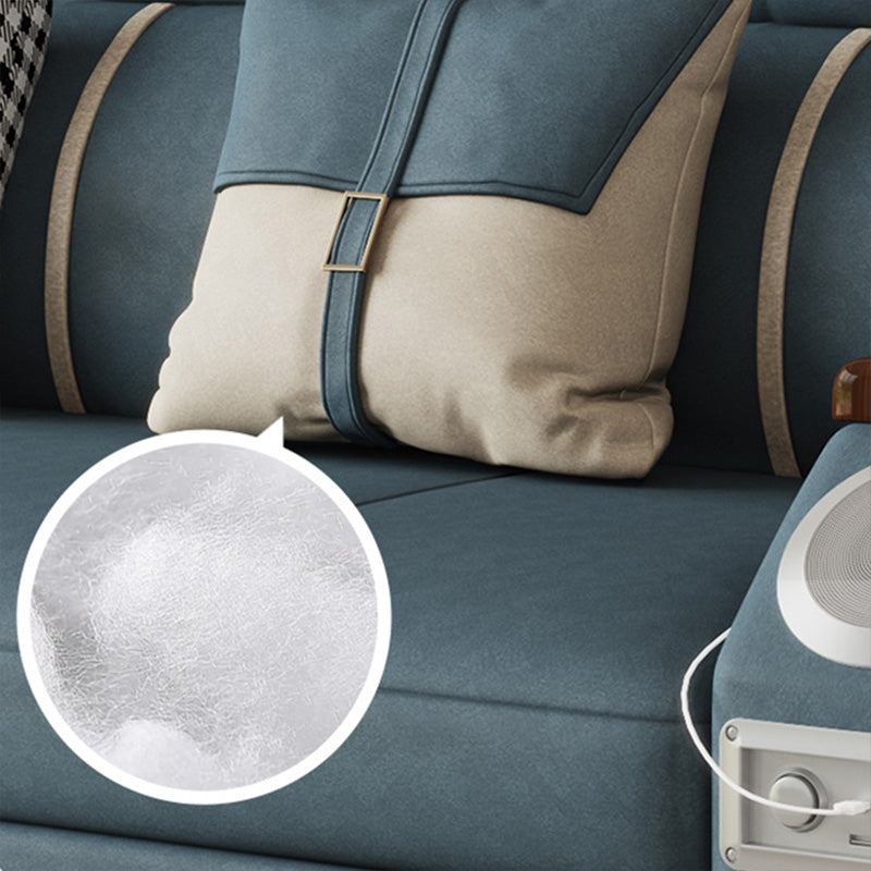 Canapé-lit bleu scandinave avec rangement et coussin en arrière