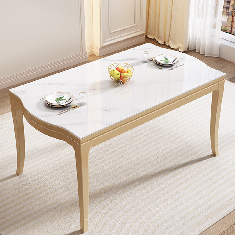 Table à manger moderne en pierre blanche avec pieds en bois massif pour le salon