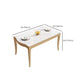 Table à manger moderne en pierre blanche avec pieds en bois massif pour le salon