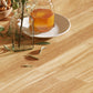 Mesa de comedor redonda de madera maciza de estilo moderno con hojas abatibles en color natural