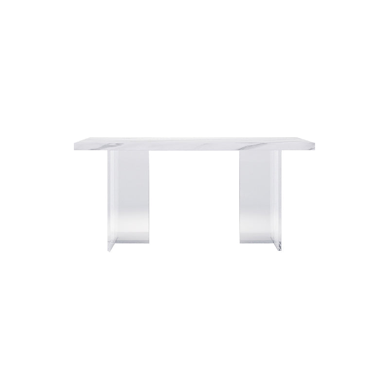 Moderne rechthoekige eettafel met stenen blad en acrylpoten voor de woonkamer