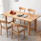Mesa de comedor rectangular de madera maciza de color natural con base de caballete