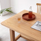 Mesa de comedor rectangular de madera maciza de color natural con base de caballete