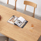 Mesa de comedor rectangular de madera maciza de color natural con base de caballete