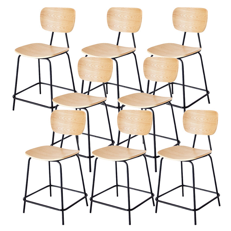 Taburetes contemporáneos de barra sin brazo con la base de metal negro