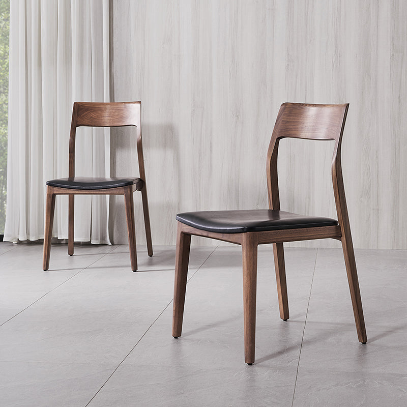 Eigentijdse binnenwalnoot massief hout open achterkant eetstoel