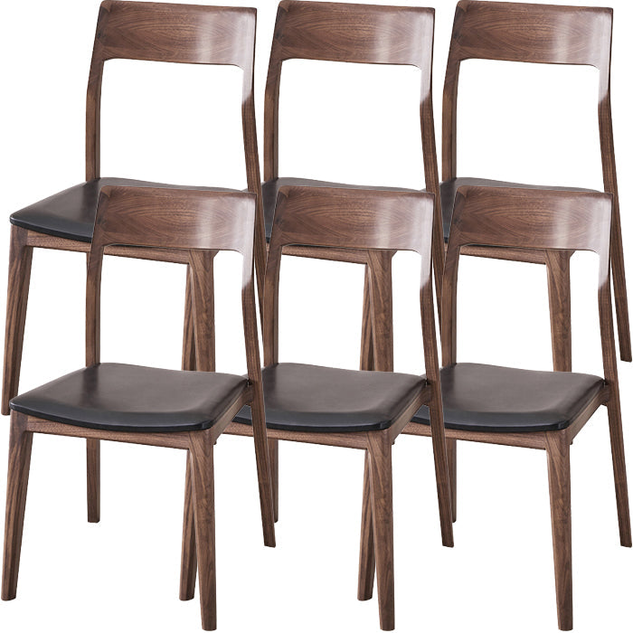 Eigentijdse binnenwalnoot massief hout open achterkant eetstoel