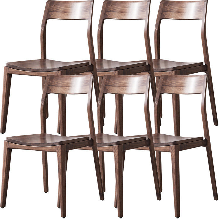 Eigentijdse binnenwalnoot massief hout open achterkant eetstoel