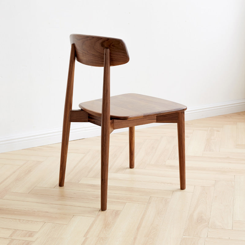 Binnen eigentijdse massief hout open rug armloze eetkamerstoel