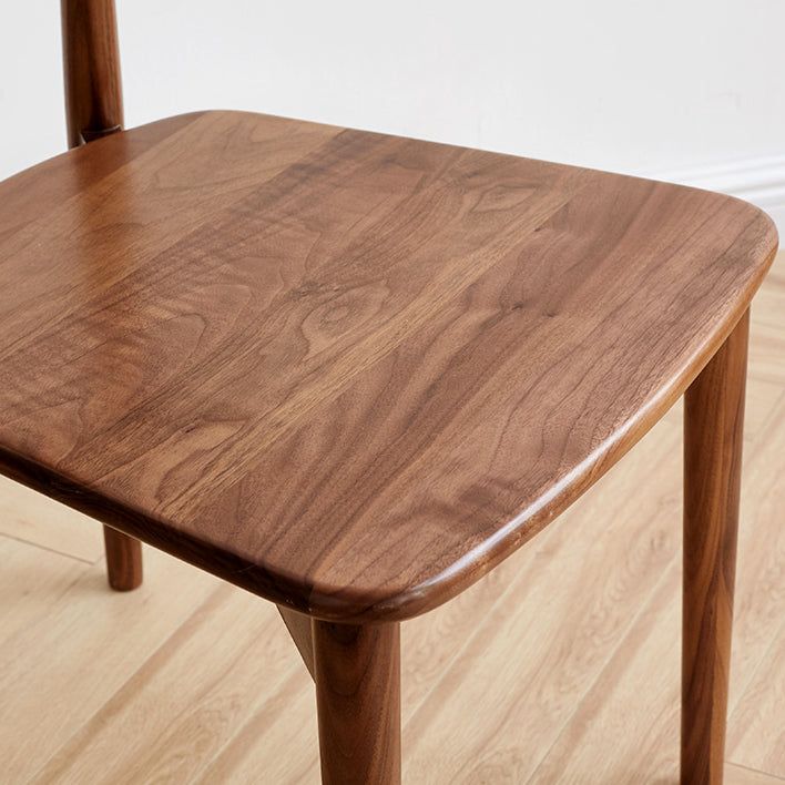 Binnen eigentijdse massief hout open rug armloze eetkamerstoel