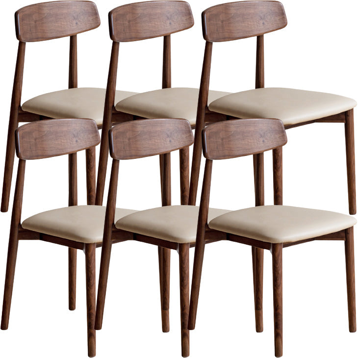 Binnen eigentijdse massief hout open rug armloze eetkamerstoel