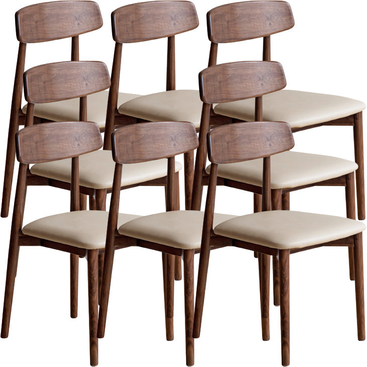 Binnen eigentijdse massief hout open rug armloze eetkamerstoel