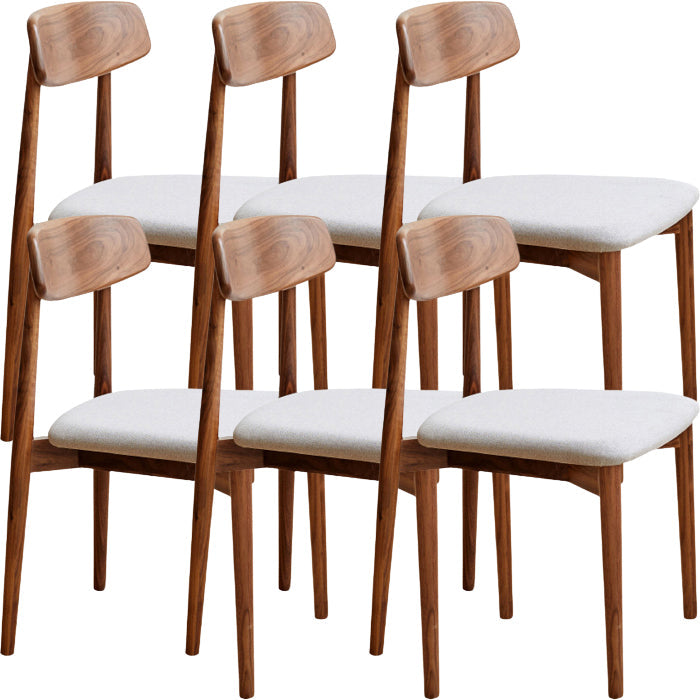 Binnen eigentijdse massief hout open rug armloze eetkamerstoel