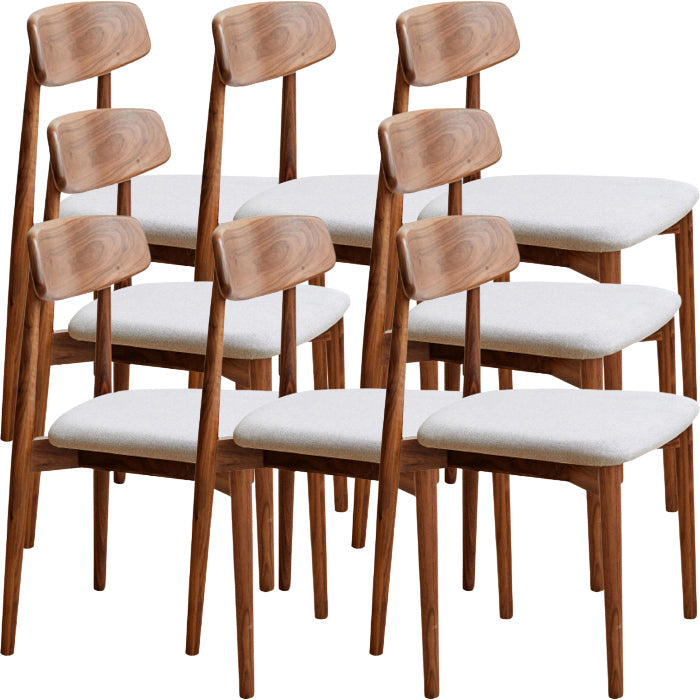 Binnen eigentijdse massief hout open rug armloze eetkamerstoel