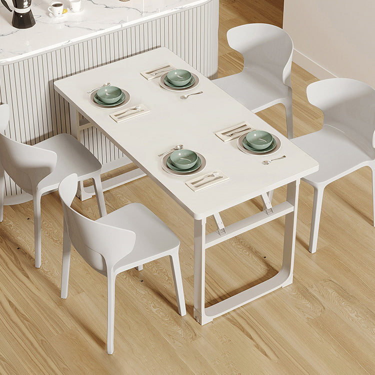 Mesa de comedor blanca plegable moderna con base de trineo de acero para comedor