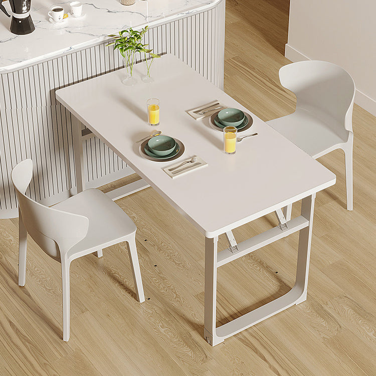 Mesa de comedor blanca plegable moderna con base de trineo de acero para comedor