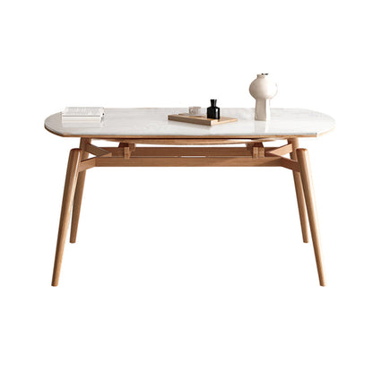 モダンな丸いダイニングテーブル白い木の脚と白い石の卓上