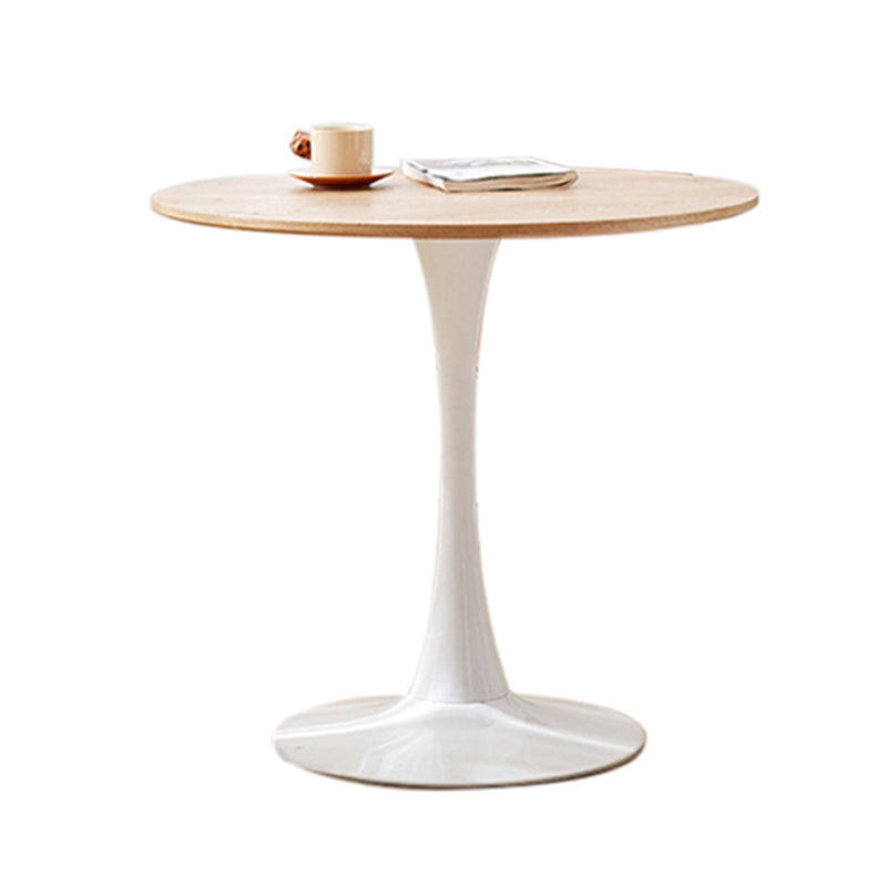 Tavolo da pranzo rotondo moderno con piano in legno naturale con base a tulipano
