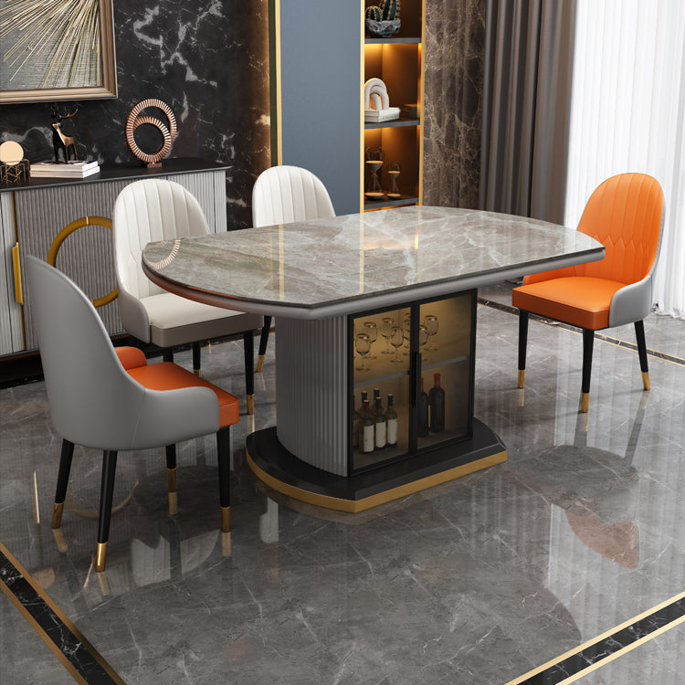 Moderne uitschuifbare eettafel rond stenen tafelblad met opbergruimte