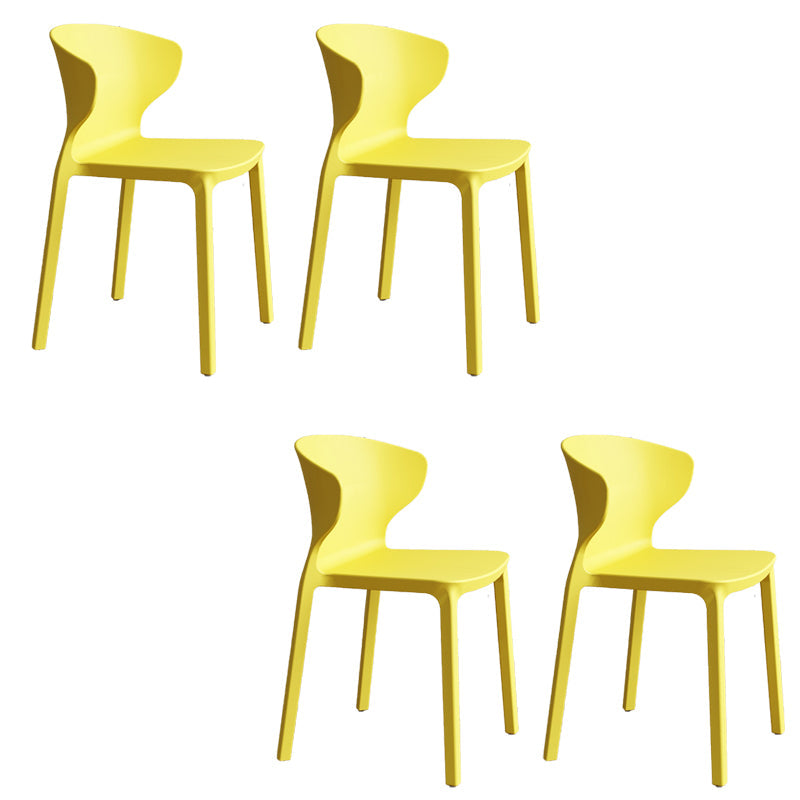 Contemporary Indoor Plastic Wingback Stackable Armless Dining Side Chair Yellow 4 Piece Set Clearhalo 'Dining Chairs' 'Dining Tables & Seating' 'dining_chair' 'furn' 'furn_dining_chair' 'Furniture' 'Kitchen & Dining Furniture' 7718150