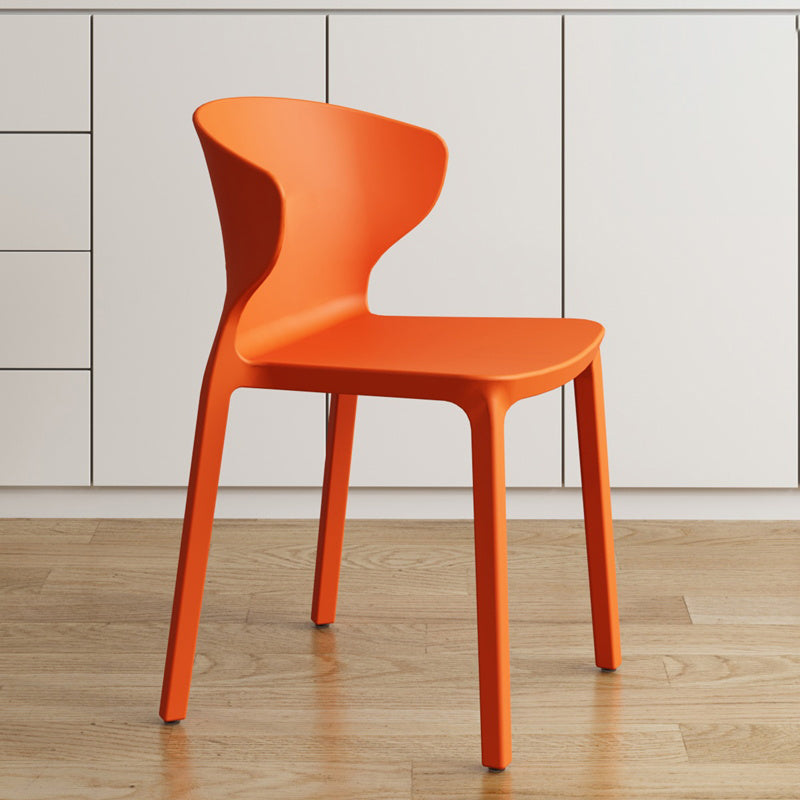 Contemporary Indoor Plastic Wingback Stackable Armless Dining Side Chair Orange 1 Piece Clearhalo 'Dining Chairs' 'Dining Tables & Seating' 'dining_chair' 'furn' 'furn_dining_chair' 'Furniture' 'Kitchen & Dining Furniture' 7718180