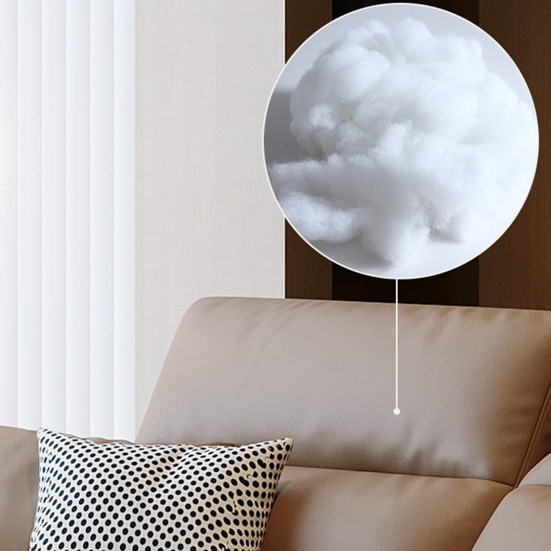 本革の枕のトップアームパワー - リビングルームにモダンなソファを押してください