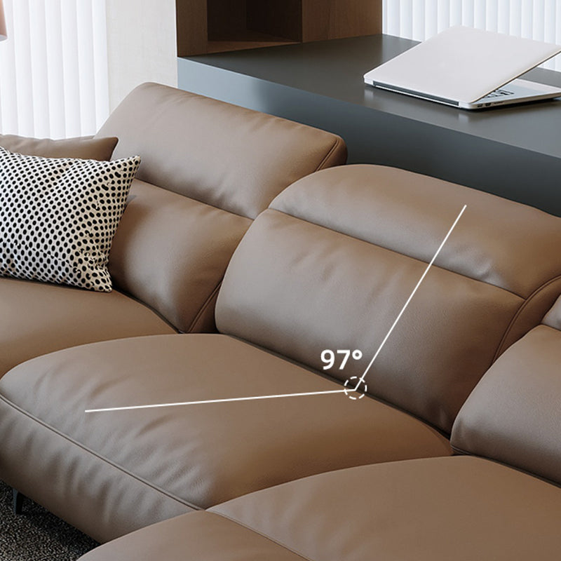 本革の枕のトップアームパワー - リビングルームにモダンなソファを押してください