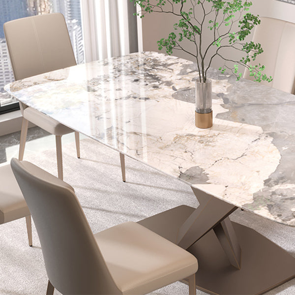 椅子付きの現代的な長方形の焼結された石のトップメタルベースダイニングテーブル