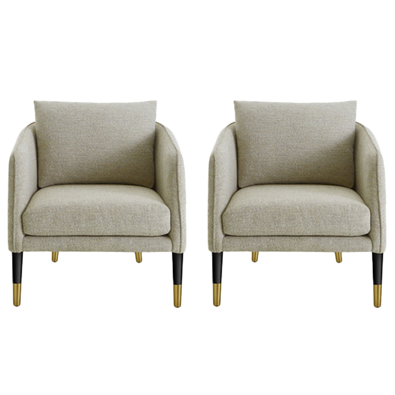 Poltrona di accento contemporaneo con cuscino posteriore e braccia inclinate