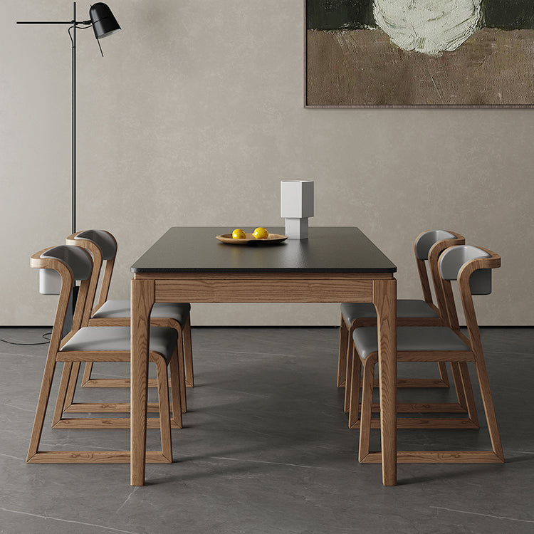 Moderne rechthoekige stenen eettafel met houten poten voor eetkamer