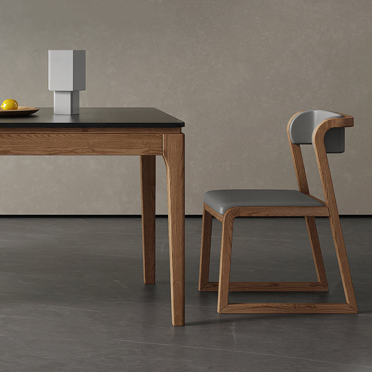 Moderne rechthoekige stenen eettafel met houten poten voor eetkamer