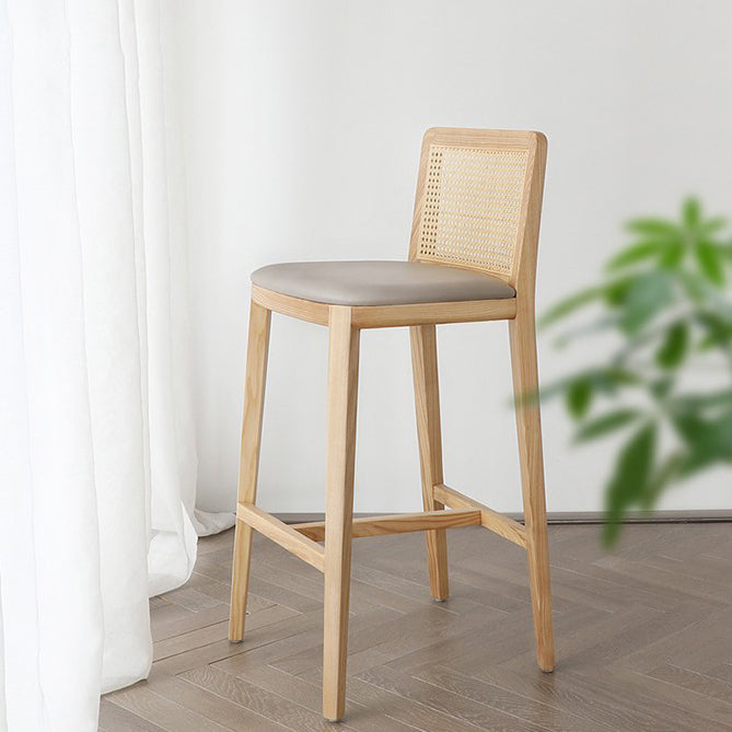 Tabouret de bar rembourré sans bras contemporain avec base en bois massif