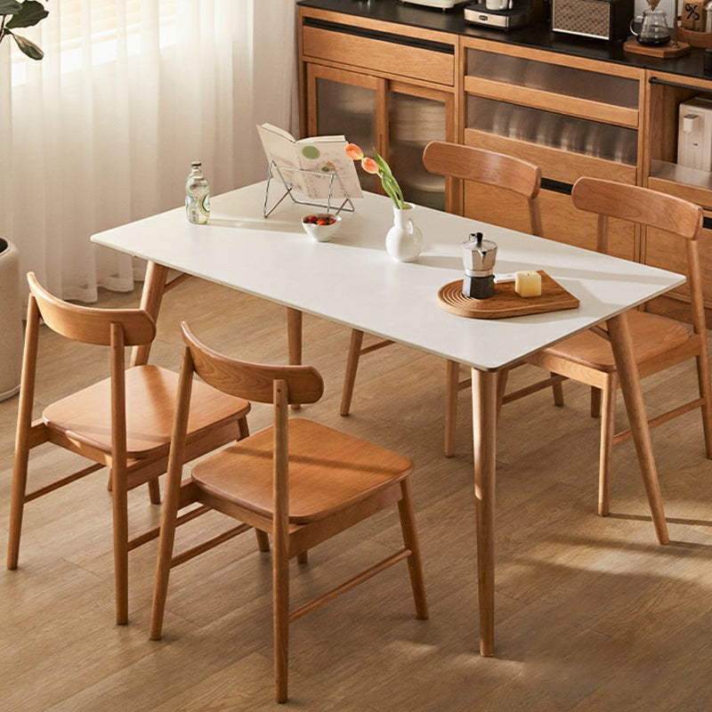 Table à manger rectangulaire blanche contemporaine avec des pattes en bois massif