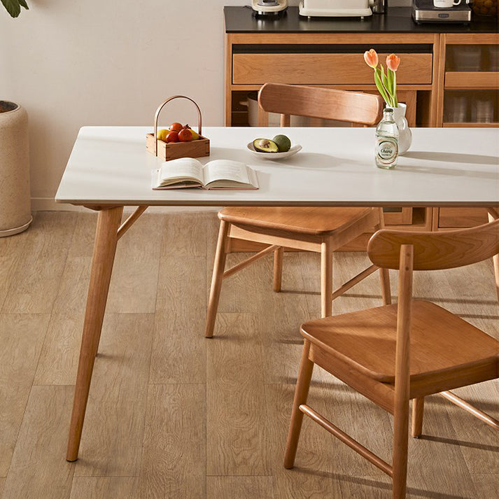 Table à manger rectangulaire blanche contemporaine avec des pattes en bois massif