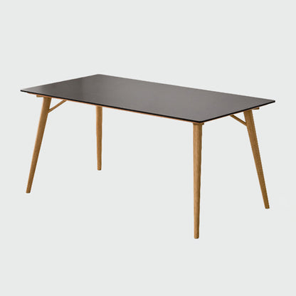 Table de salle à manger rectangulaire moderne avec plateau en pierre noire et 4 pieds en bois massif