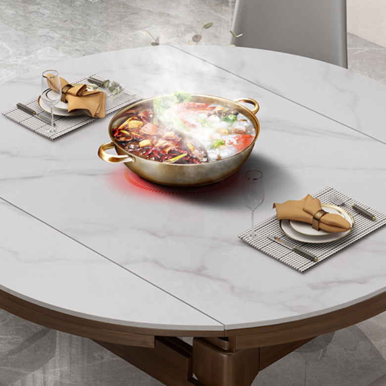 Mesa de comedor redonda moderna de piedra extensible para espacios pequeños en gris