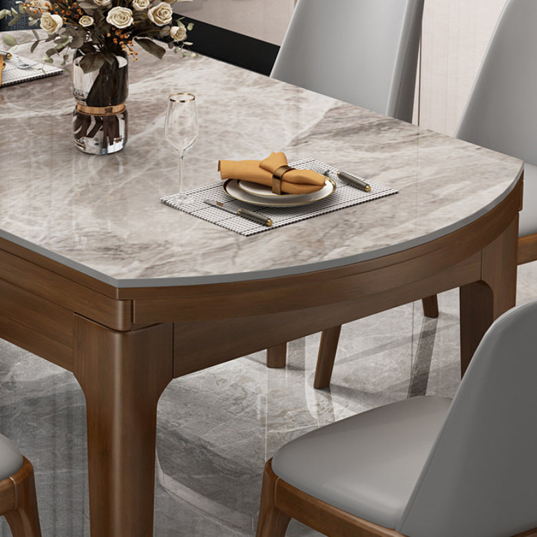Mesa de comedor redonda moderna de piedra extensible para espacios pequeños en gris