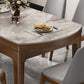 Mesa de comedor redonda moderna de piedra extensible para espacios pequeños en gris