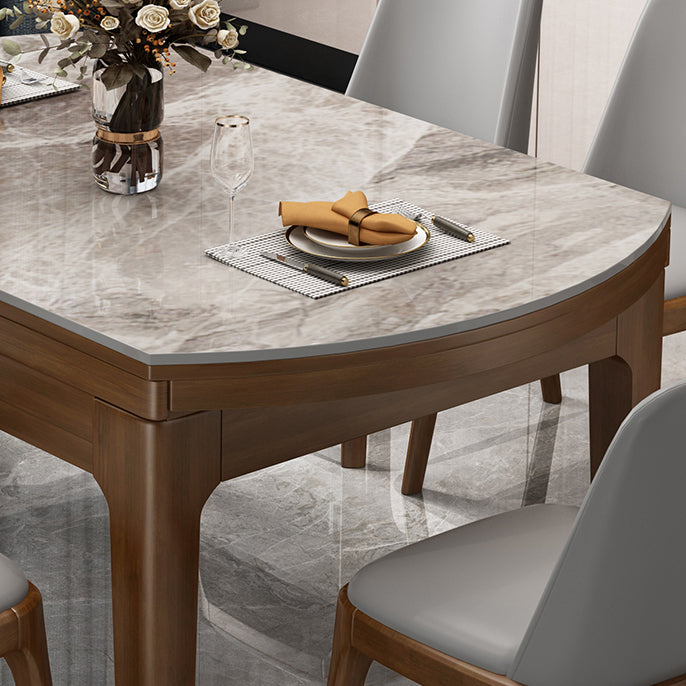 Mesa de comedor redonda moderna de piedra extensible para espacios pequeños en gris