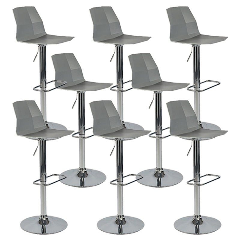 Taburete de bar ajustable de plástico estilo moderno con patas de metal