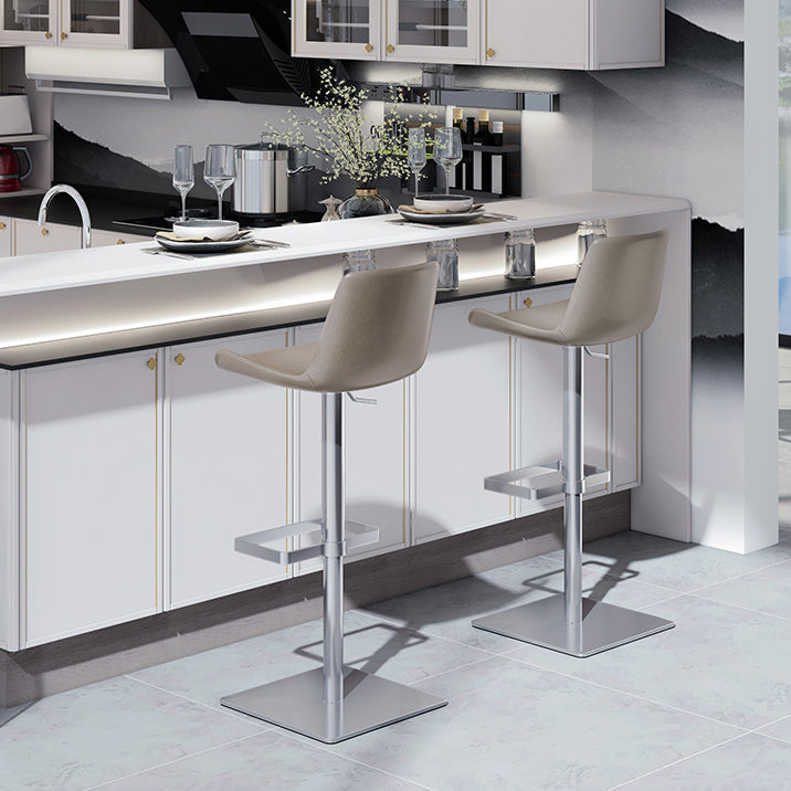 Taburete de bar de cuero giratorio de altura ajustable contemporáneo con reposapiés