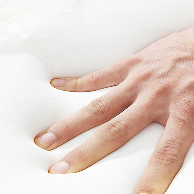 Sofá de durmiente de Futon Futon Glam Faux en almohada naranja incluida