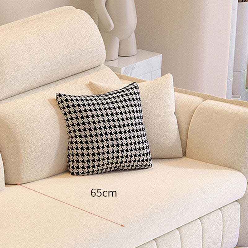 Moderno e contemporaneo in finta pelle imbottita di divano futon in bianco