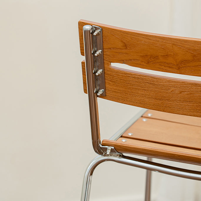 Sgabello da bar senza braccia con poggiatebra contemporanea con base in metallo d'argento